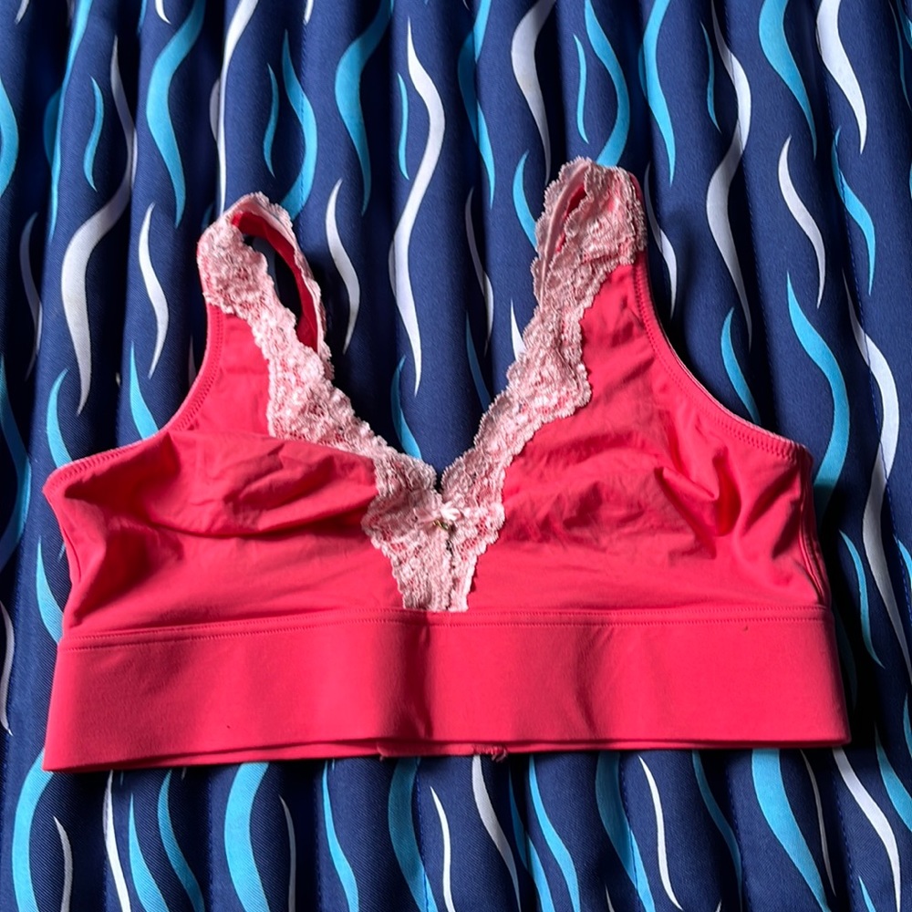 Previously owned, excellent condition hot pink bra